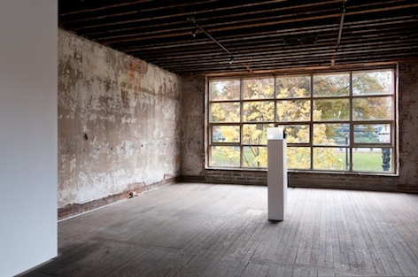 "Miniature in Black and White" 1972
Continuous slide installation, eighty-one 35mm slides, Kodak Carousel Projector, wood pedestal, miniature Plexiglass screen. Installation at Zena Zezza 2014.